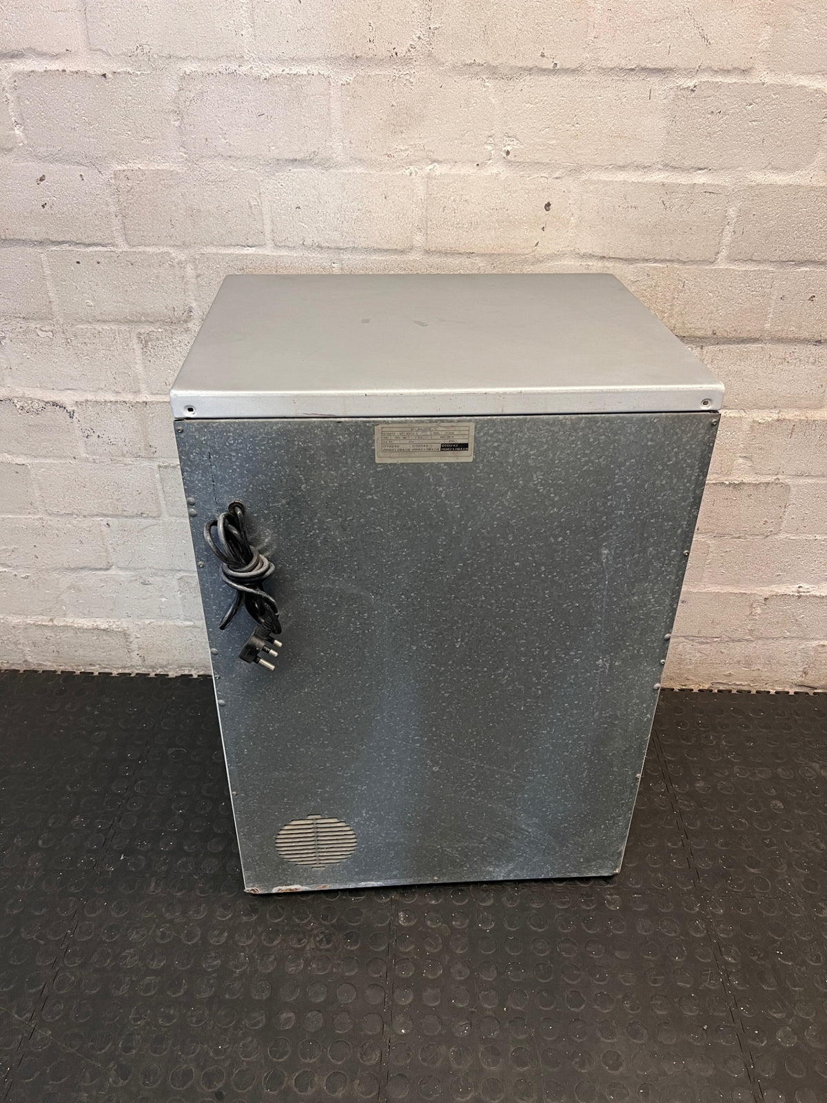 Grey Freestanding Front Loading Tumble Dryer — Drum Does Not Spin; Element and Fan Functional – back view