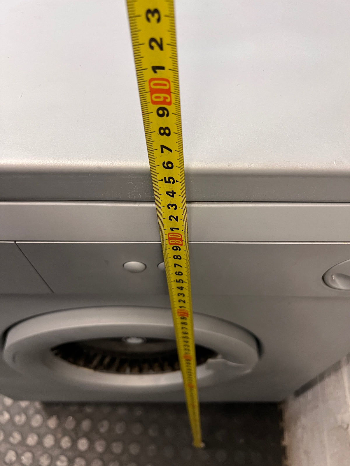 Grey Freestanding Front Loading Tumble Dryer — Drum Does Not Spin; Element and Fan Functional – height measurement