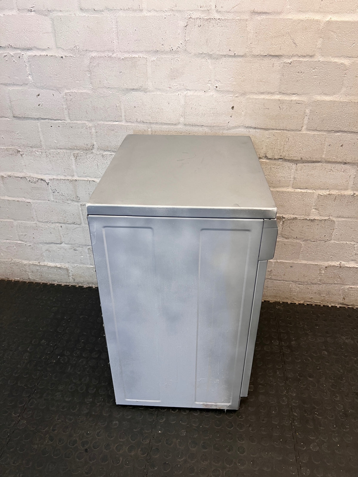 Grey Freestanding Front Loading Tumble Dryer — Drum Does Not Spin; Element and Fan Functional – top view