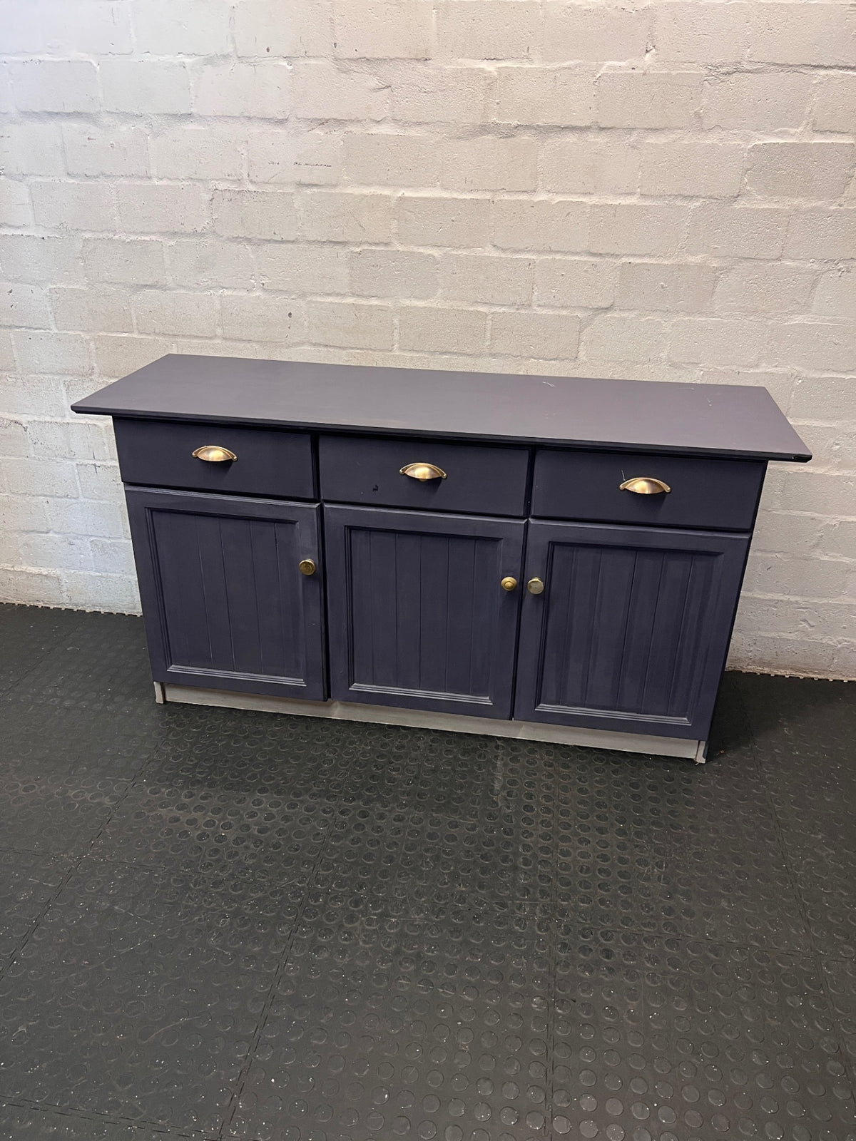 Grey Three-Door Sideboard with Brass-Toned Handles — Well Used with Significant Wear – main front view