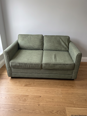 Nest Homes Green Fabric Sleeper Couch — Minimal Wear and Tear – styled product image