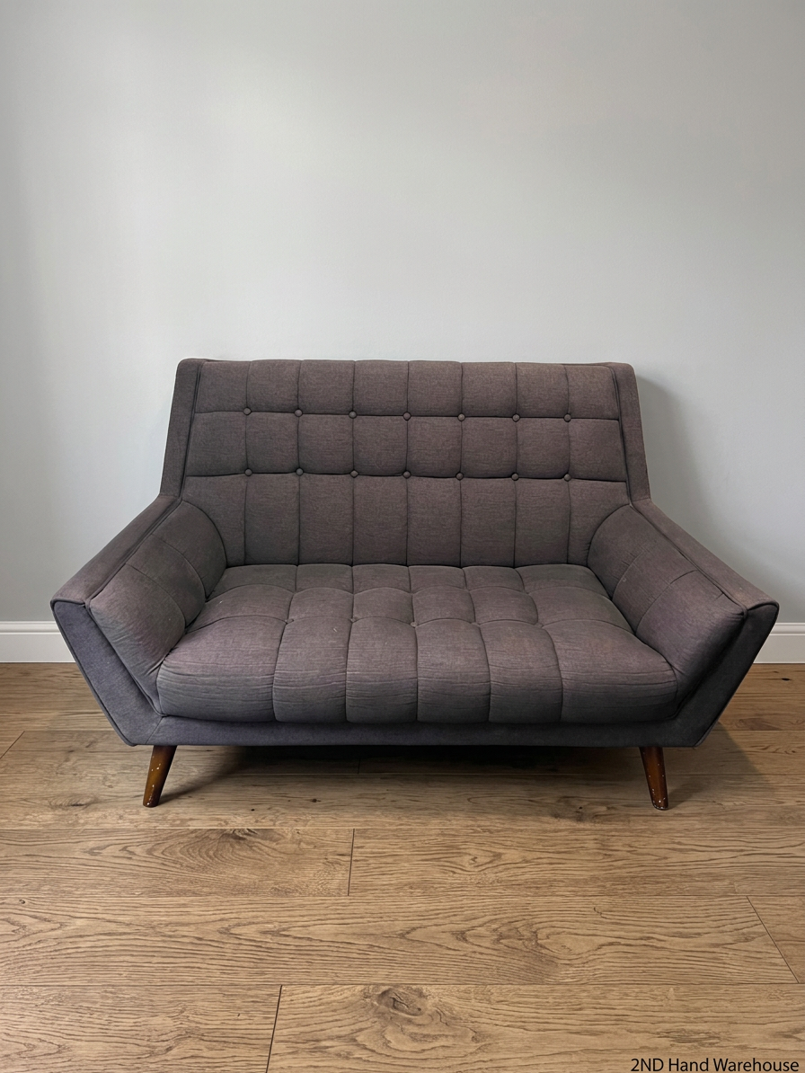 Grey Tufted Fabric 2 Seater Couch with Wooden Legs — Good with Minor Wear and Tear – styled product image