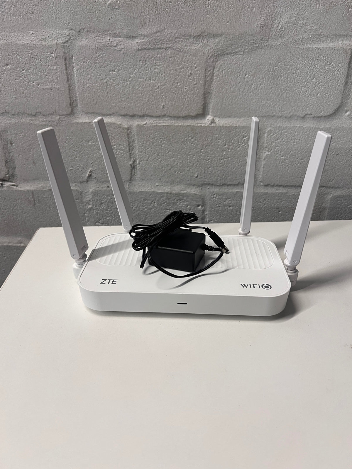 ZTE White WiFi 6 Router with Power Adapter — Good Working Order – main front view