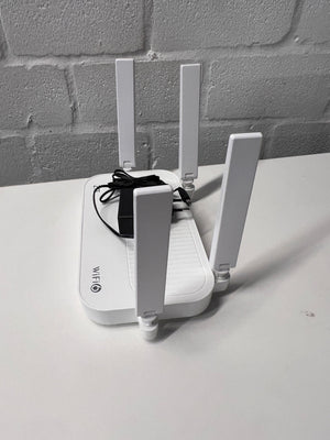 ZTE White WiFi 6 Router with Power Adapter — Good Working Order – side view