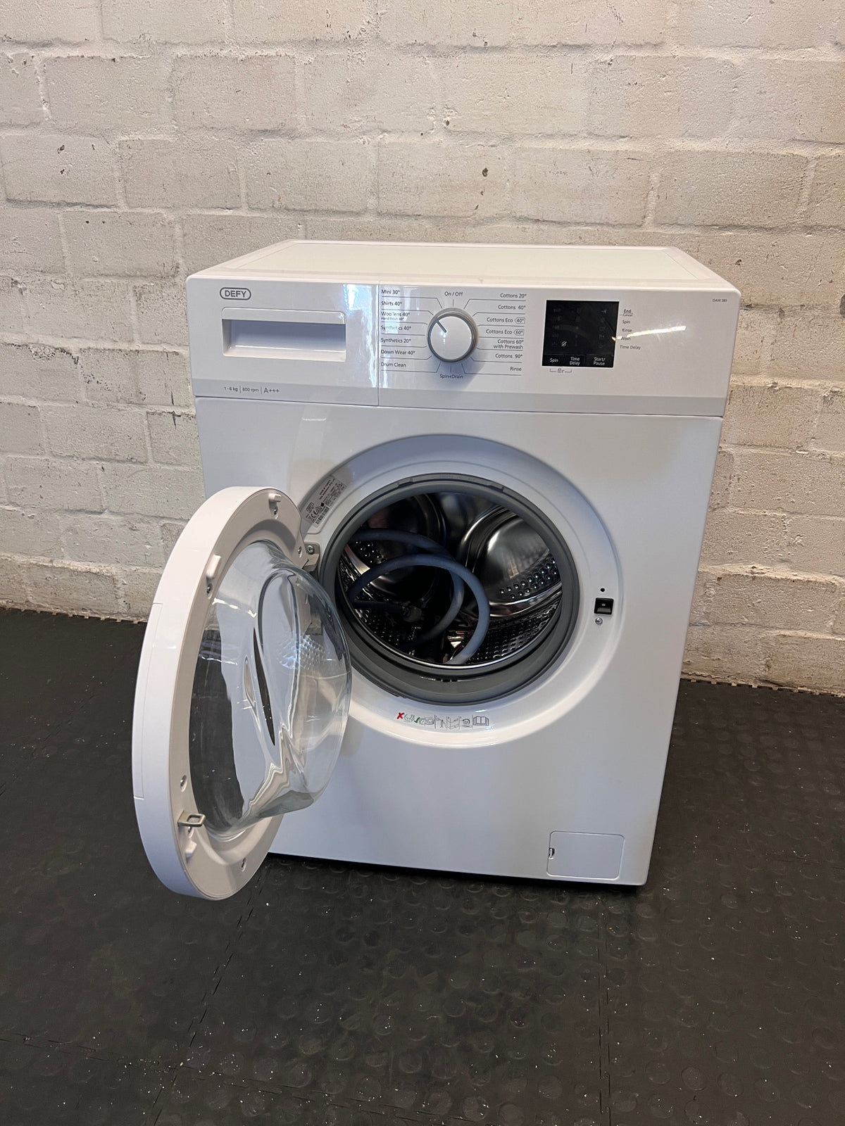 Defy 6kg White Front Loader Washing Machine — Good Working Order – side view