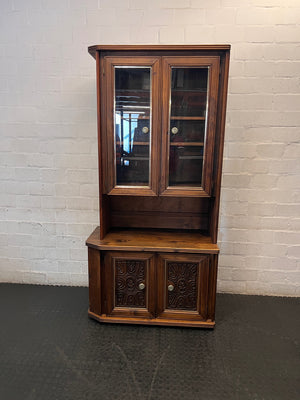 Vintage Wood Display Cabinet with Glass Doors & Carved Detail – main front view