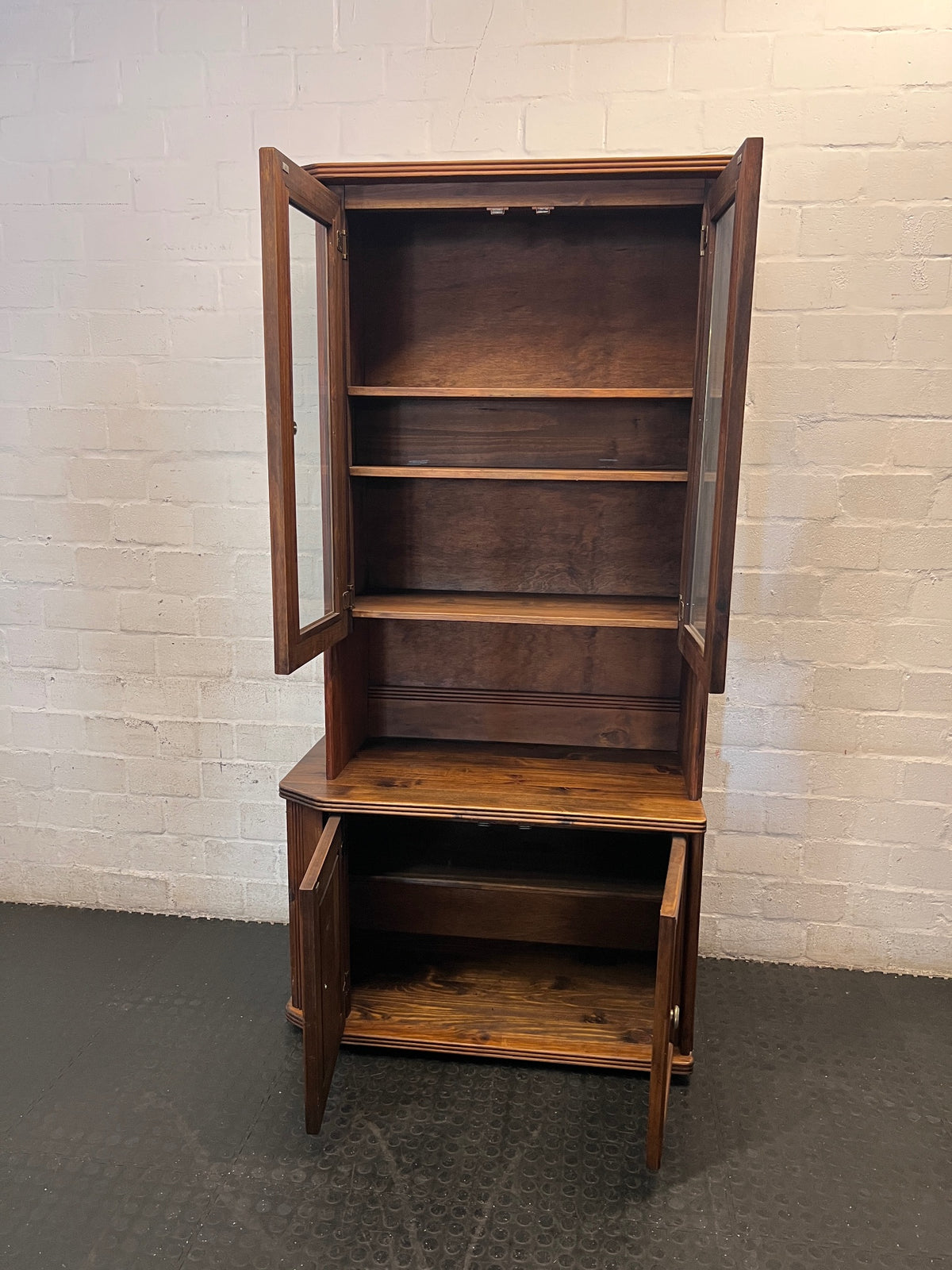 Vintage Wood Display Cabinet with Glass Doors & Carved Detail – side view