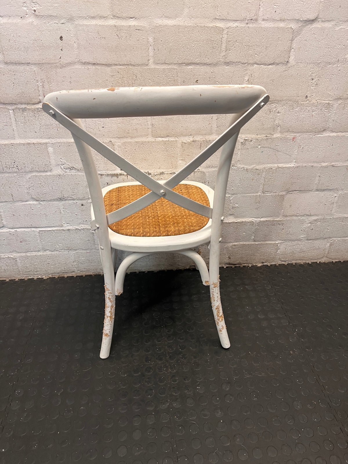White Cross-Back Dining Chair with Rattan Seat – back view