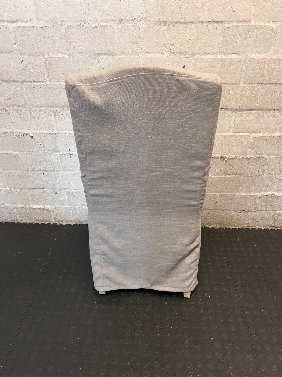 Grey High-Back Upholstered Dining Chair with Skirt – back view