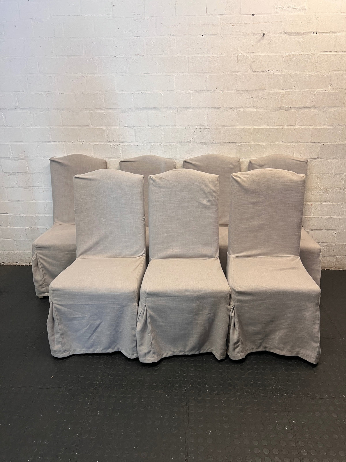 Grey High-Back Upholstered Dining Chair with Skirt – side view