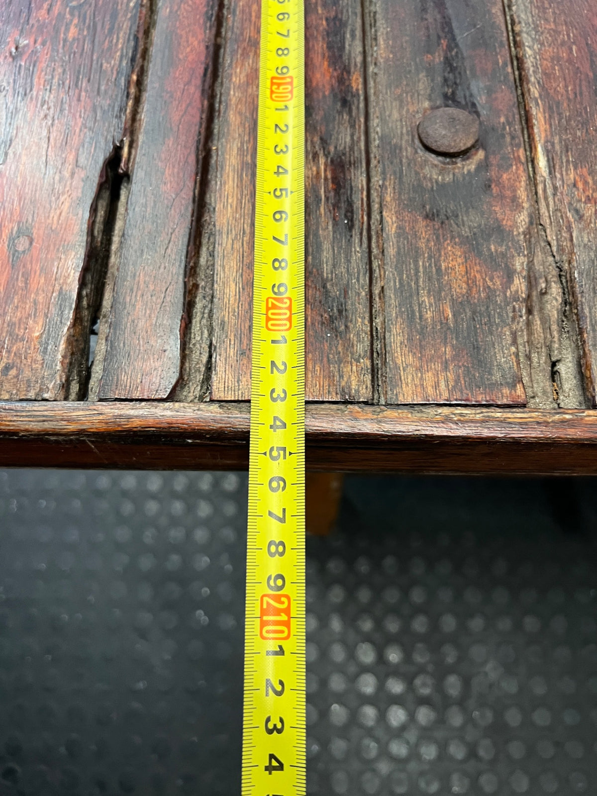 Large Dark Varnished Wood Outdoor Table — Broken Leg Join and Structural Damage – depth measurement
