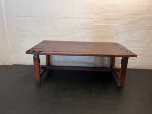 Large Dark Varnished Wood Outdoor Table — Broken Leg Join and Structural Damage – main front view