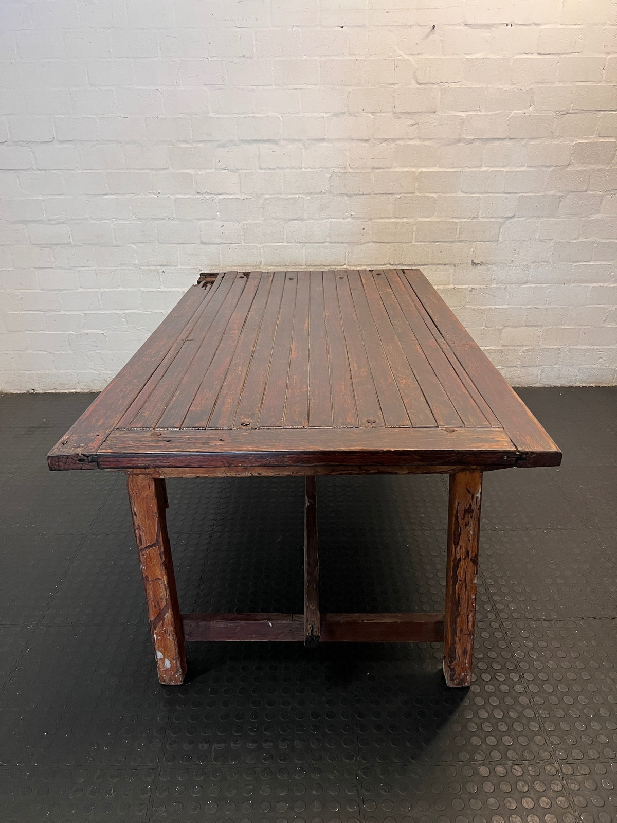 Large Dark Varnished Wood Outdoor Table — Broken Leg Join and Structural Damage – side view