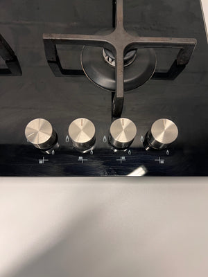 Whirlpool Black Glass 4-Burner Gas Hob – condition detail