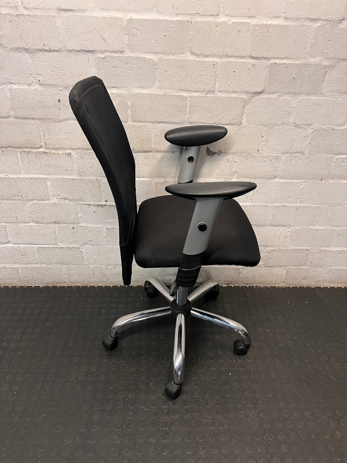 Black Mesh Office Chair with Chrome Base – back view