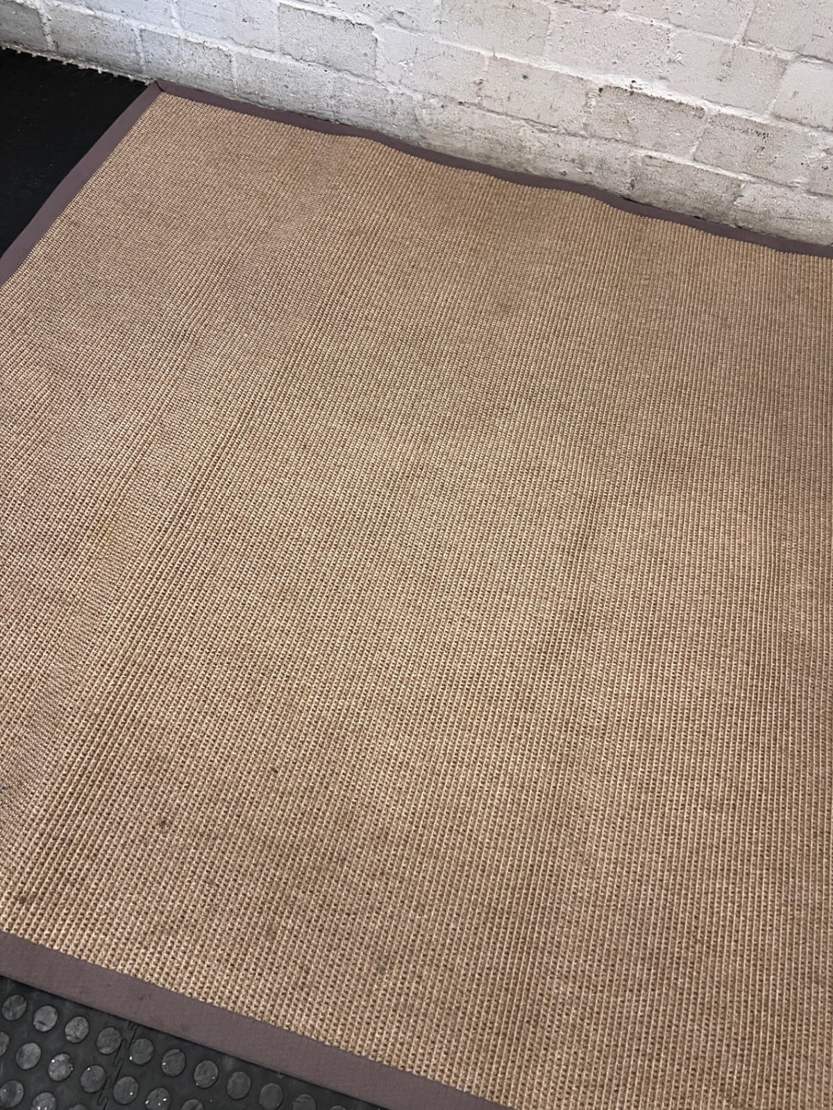 Woven Brown Square Area Rug with Fabric Border – back view