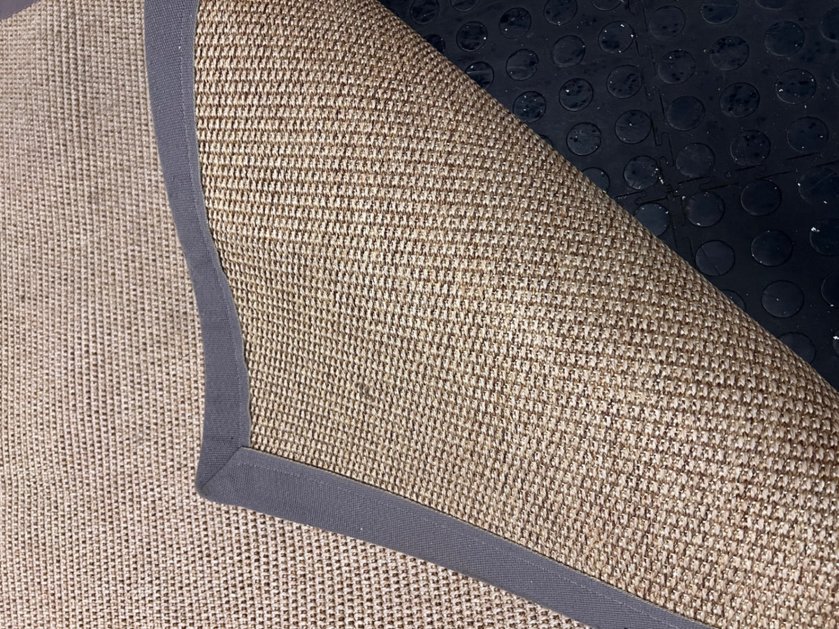 Woven Brown Square Area Rug with Fabric Border – top view