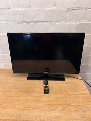 Samsung Flat Screen TV with Remote and Stand — Does Not Power On; No Power LED Indicator – top view