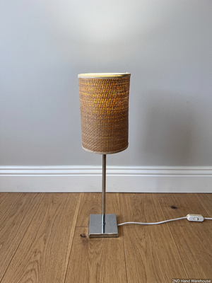 Modern Chrome Table Lamp with Woven Shade – styled product image