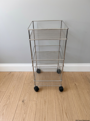 Three-Tier Metal Utility Trolley on Wheels – styled product image