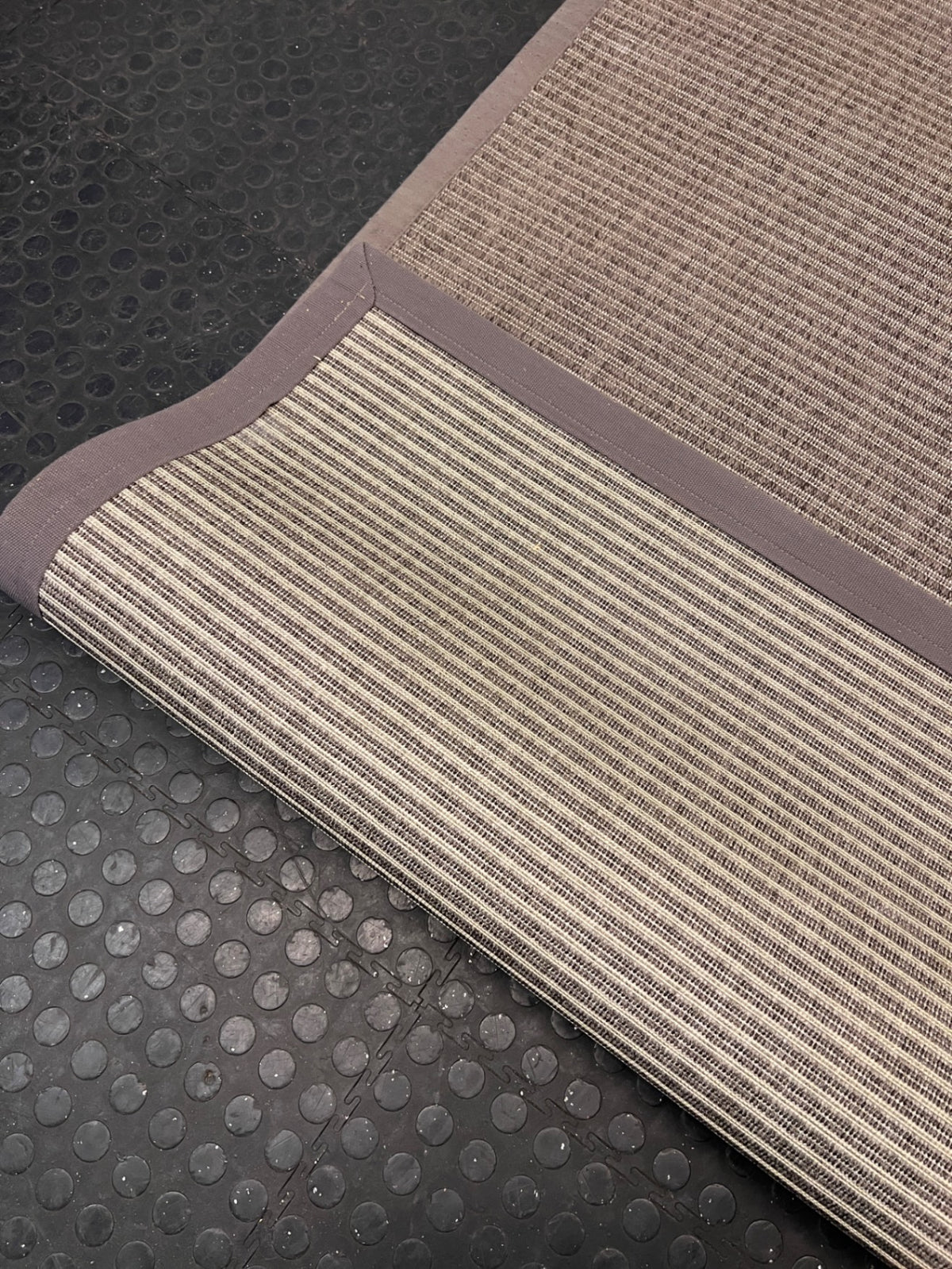 Grey Textured Flat-Weave Area Rug with Fabric Border – top view