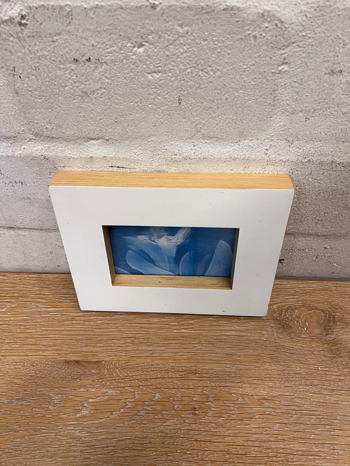 White Rectangular Picture Frame with Wooden Inner Edge – side view