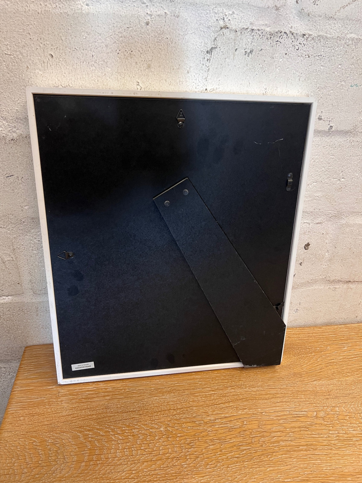 Minimalist Nautilus Shell Framed Artwork by Leana – side view