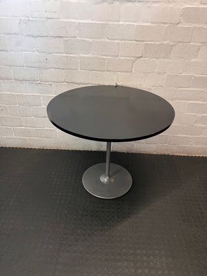 Round Black Table with Metallic Pedestal Base – top view