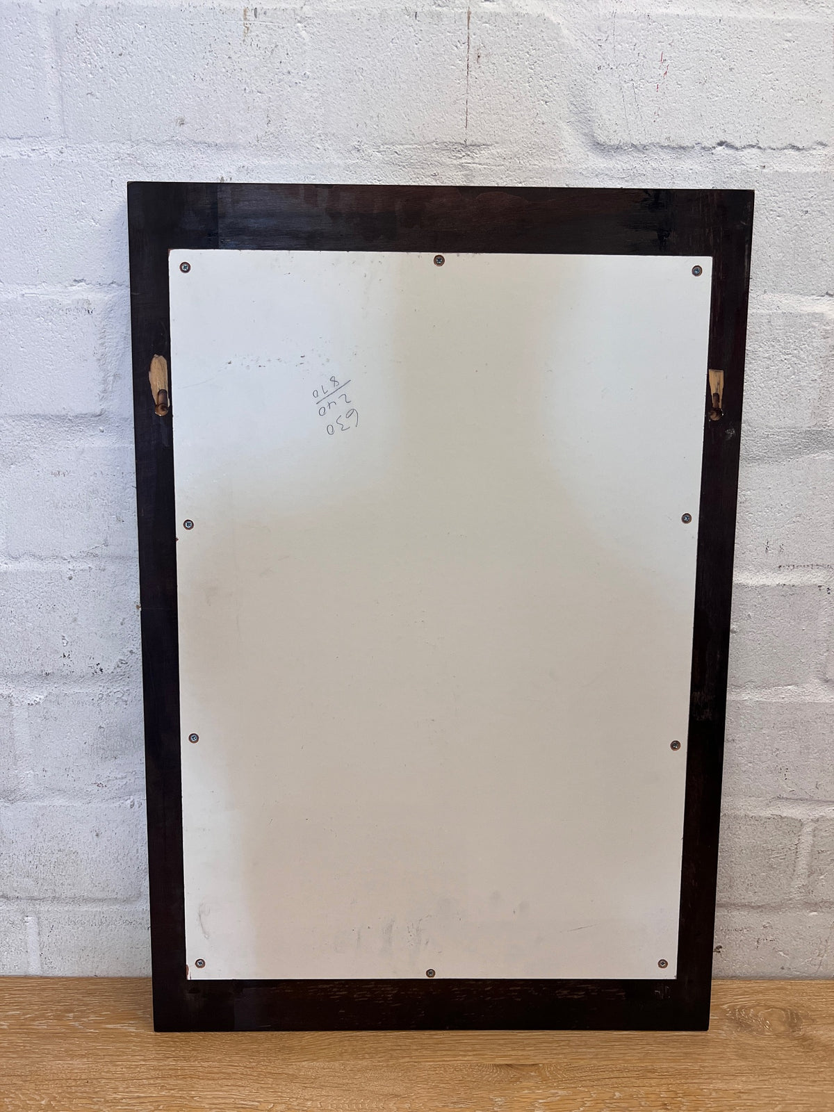 Dark Framed Rectangular Wall Mirror – condition detail