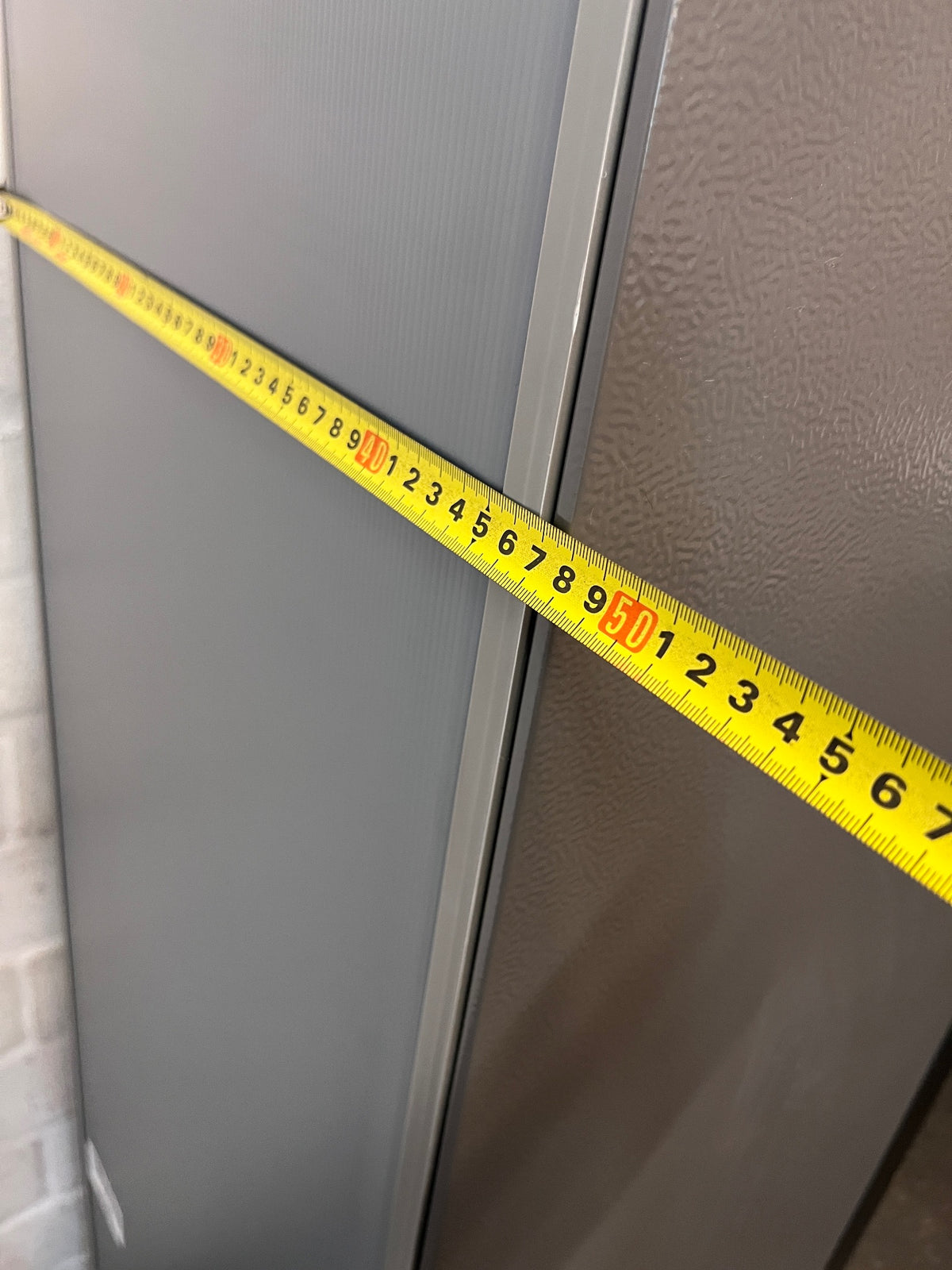 Hisense 154L Top Freezer Fridge in Titanium Silver – depth measurement