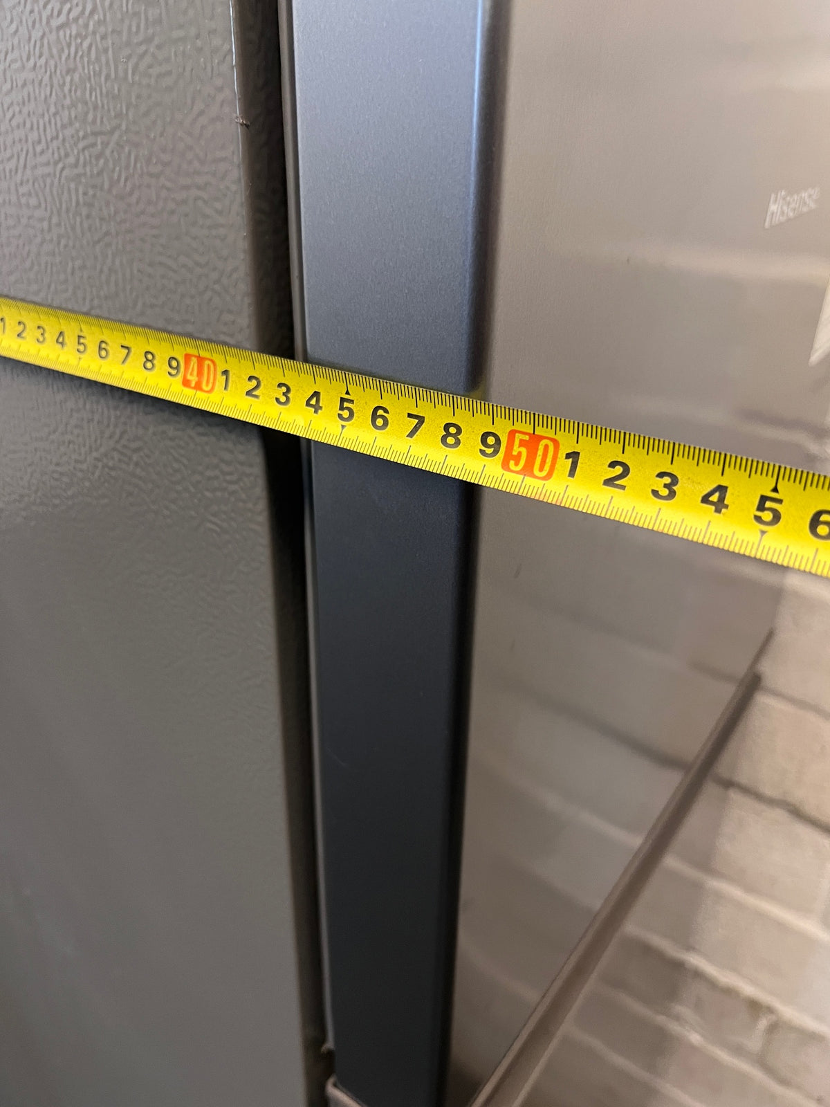 Hisense 154L Top Freezer Fridge in Titanium Silver – width measurement