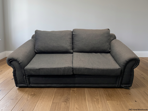 Grey Upholstered 2 Seater Couch with Rolled Arms — Structural Damage – styled product image
