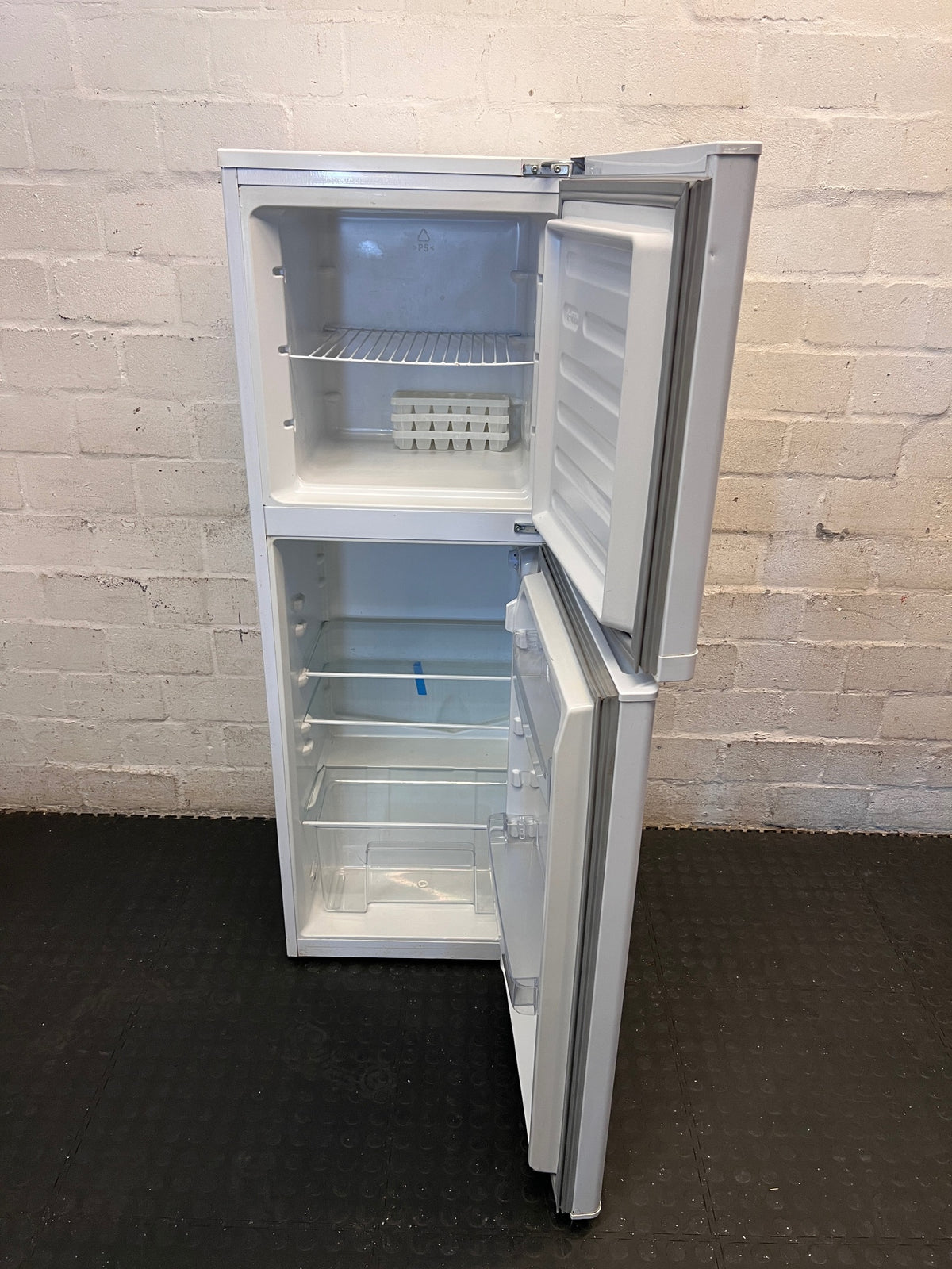 White KIC Top-Mount Fridge Freezer — Working with Burn Damage on Top – side view