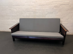 Dark Wood Sleeper Couch with Grey Mattress – main front view