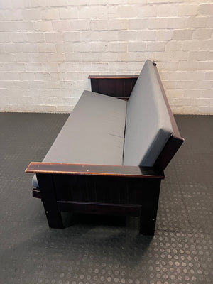 Dark Wood Sleeper Couch with Grey Mattress – top view