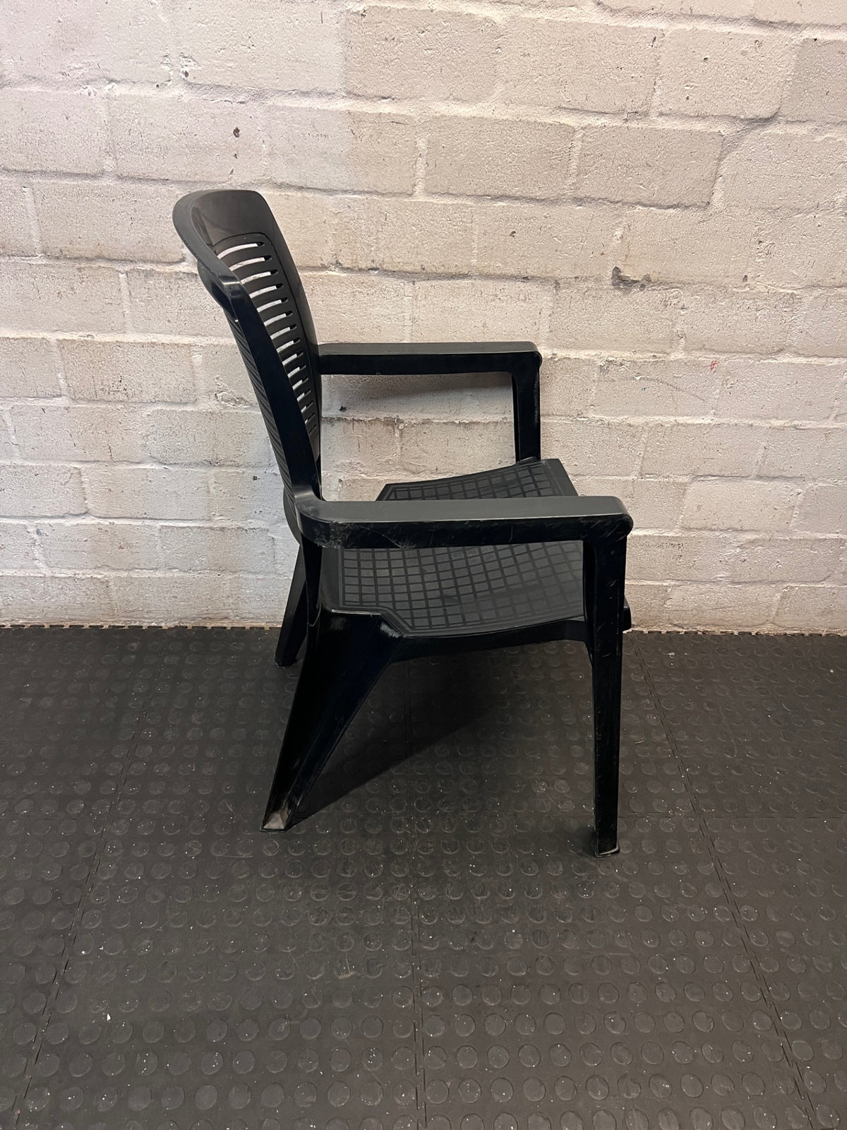 Black Plastic Outdoor Armchair – top view