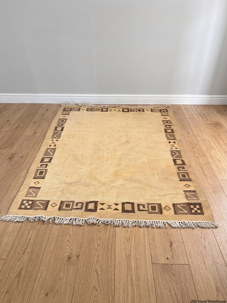 Geometric Border Patterned Fringed Area Rug – styled product image