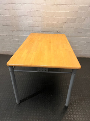 Rectangular Wood-Look Table with Grey Steel Legs – side view