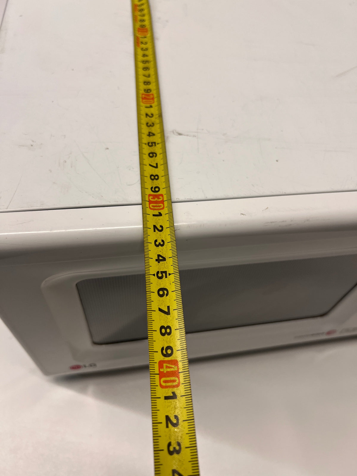 LG Intellowave Countertop Microwave in White — Burning Odour During Use and Missing Internal Plate – depth measurement