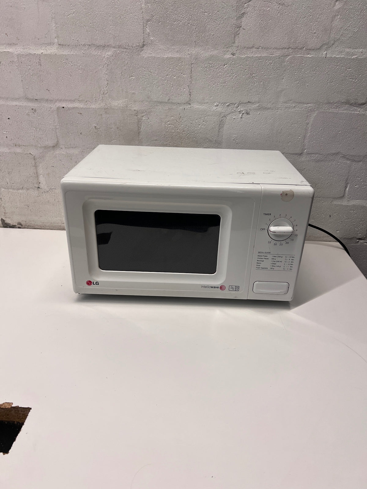 LG Intellowave Countertop Microwave in White — Burning Odour During Use and Missing Internal Plate – main front view