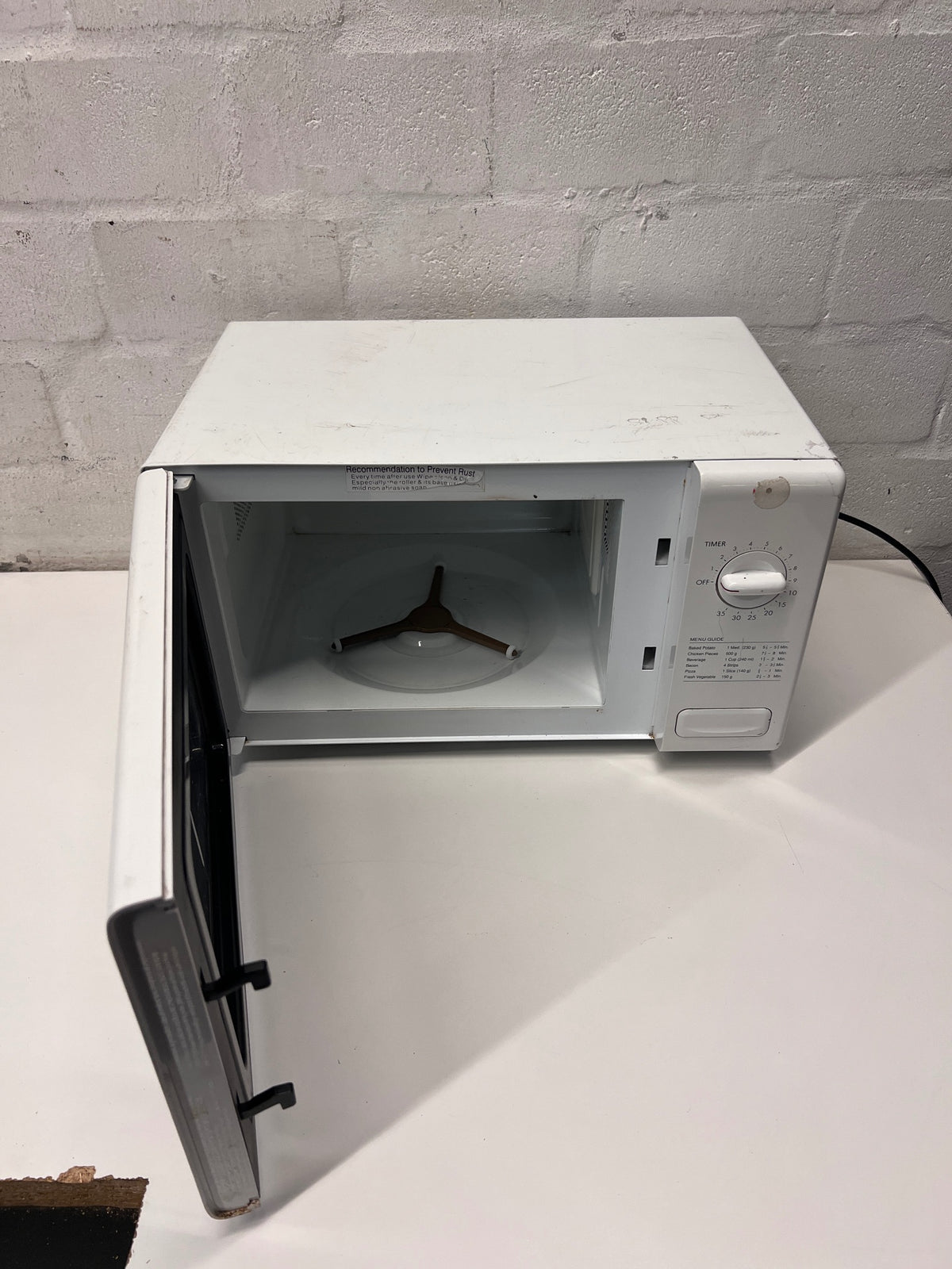 LG Intellowave Countertop Microwave in White — Burning Odour During Use and Missing Internal Plate – side view
