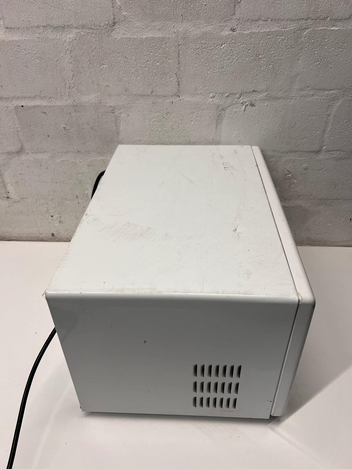 LG Intellowave Countertop Microwave in White — Burning Odour During Use and Missing Internal Plate – top view