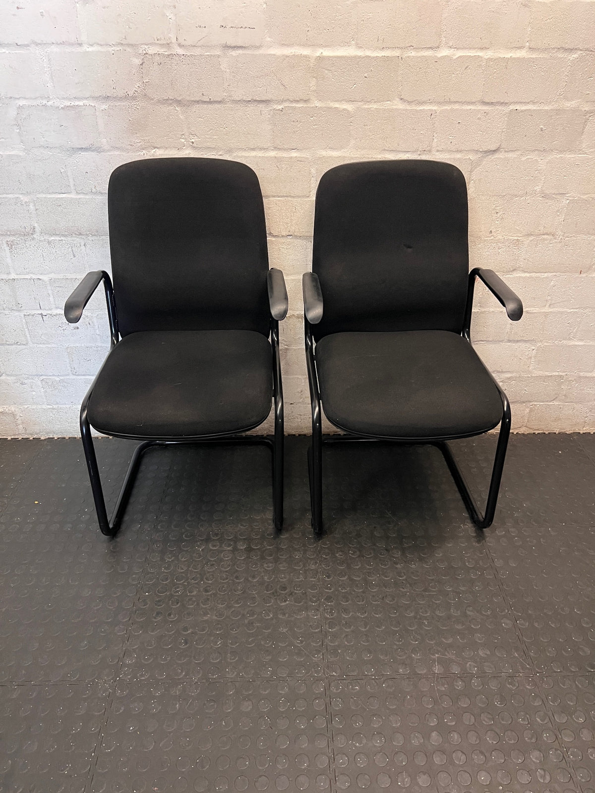 Black Upholstered Office Visitors Chair with Arms – side view