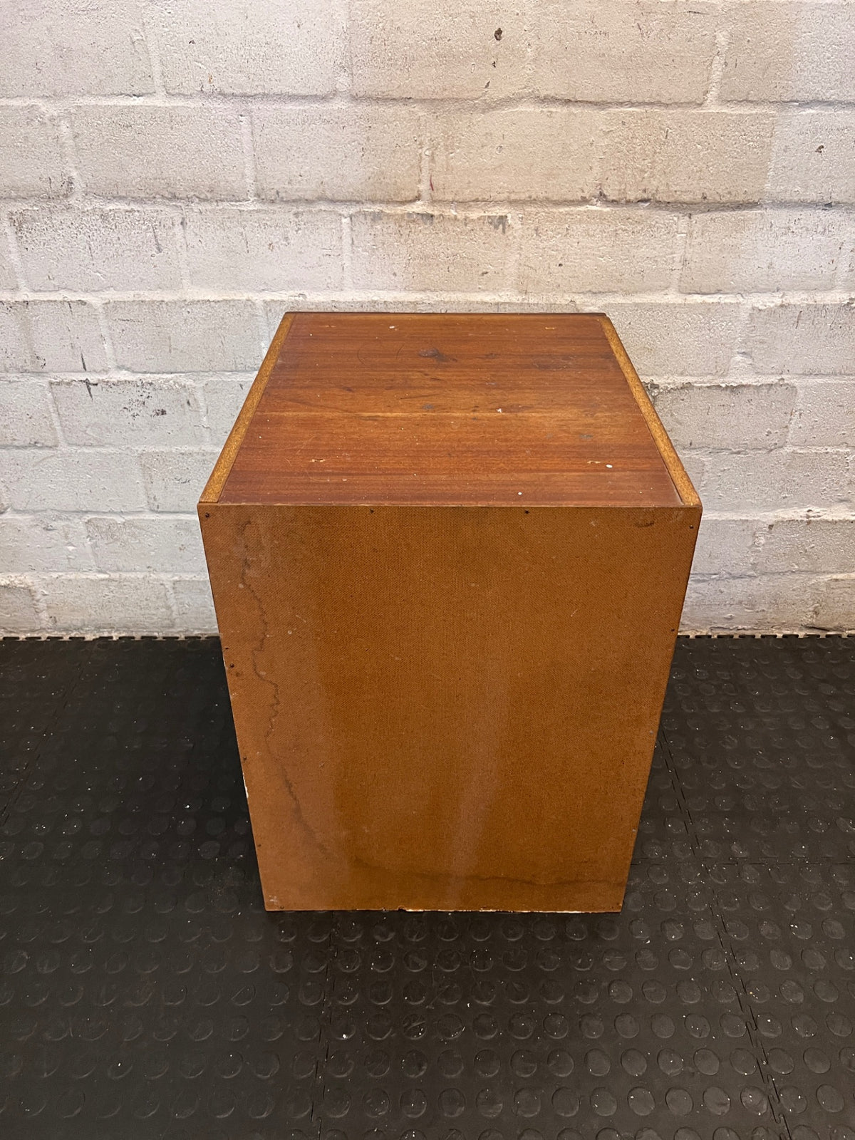 Dark Brown Wood Side Cabinet with Moulding Detail — Visible Damage to Cabinet Doors – top view