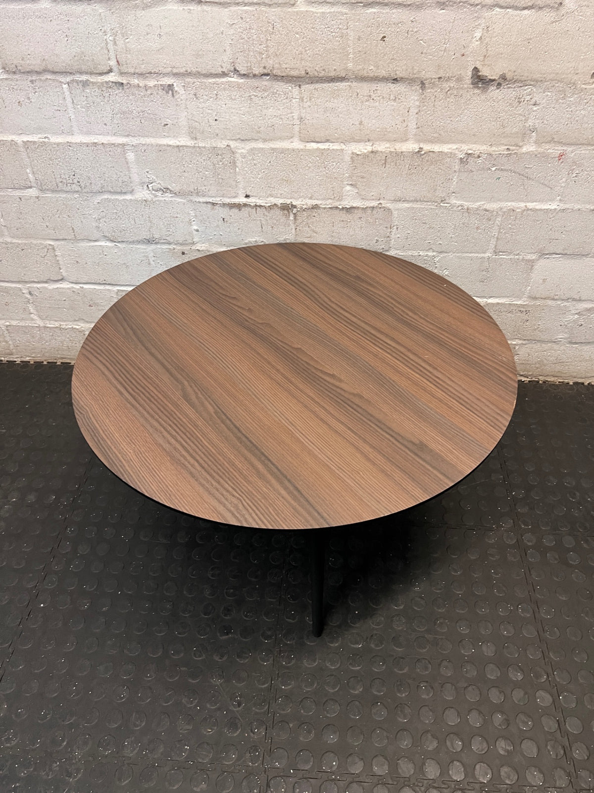 Round Wood-Grain Finish Coffee Table with Tapered Legs – back view