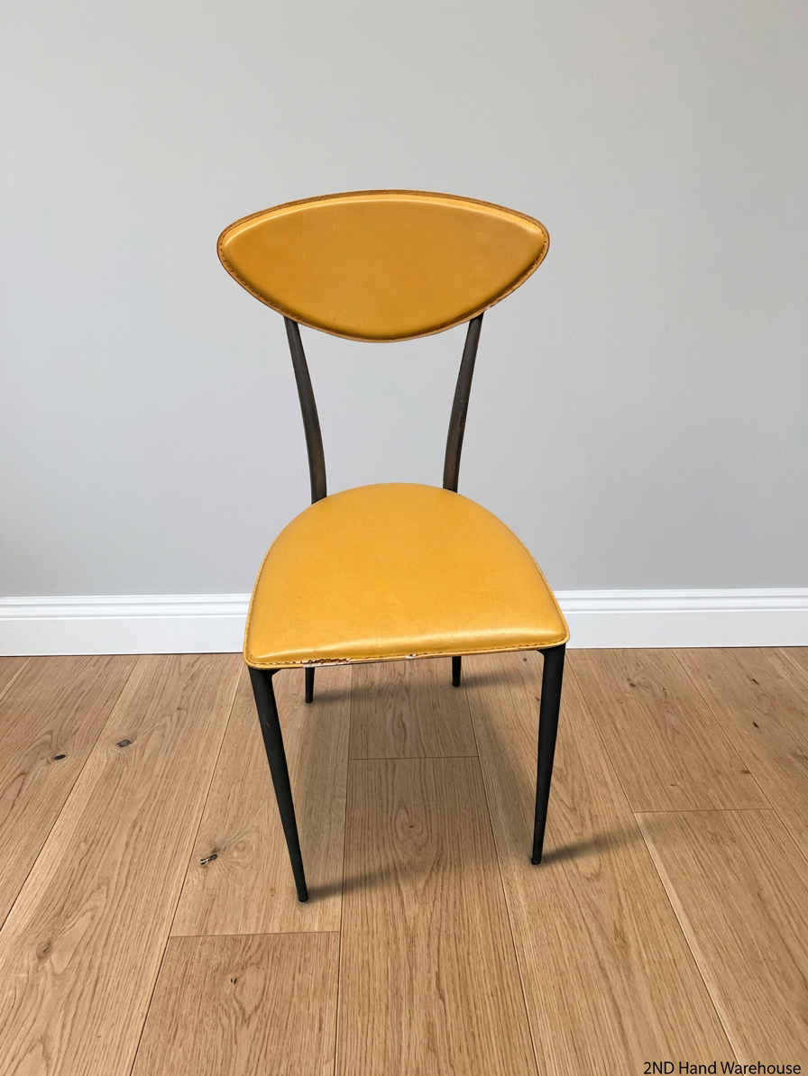 Yellow Upholstered Dining Chair with Tapered Metal Legs – styled product image