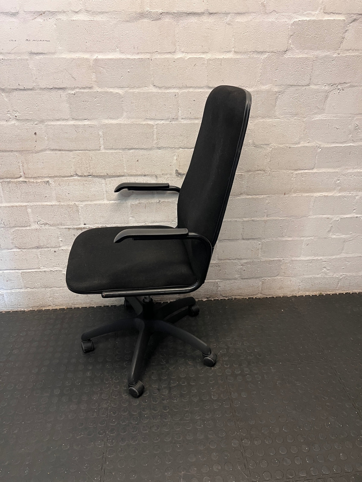 Black High-Back Upholstered Office Chair – side view