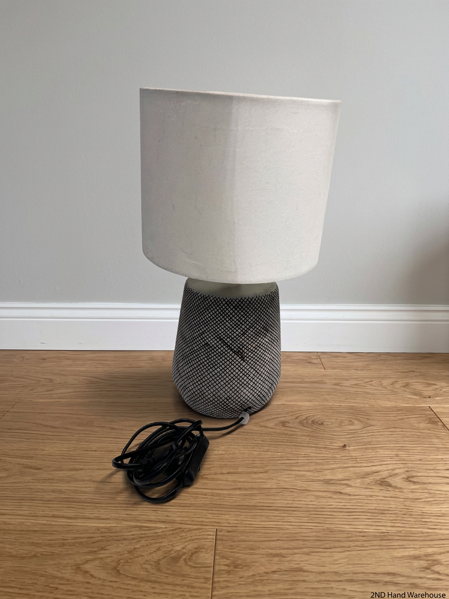 Patterned Base Table Lamp with White Fabric Shade – styled product image