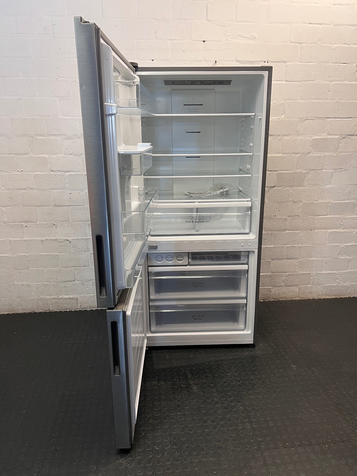 Hisense Brushed Steel Fridge Freezer with Water Dispenser – side view