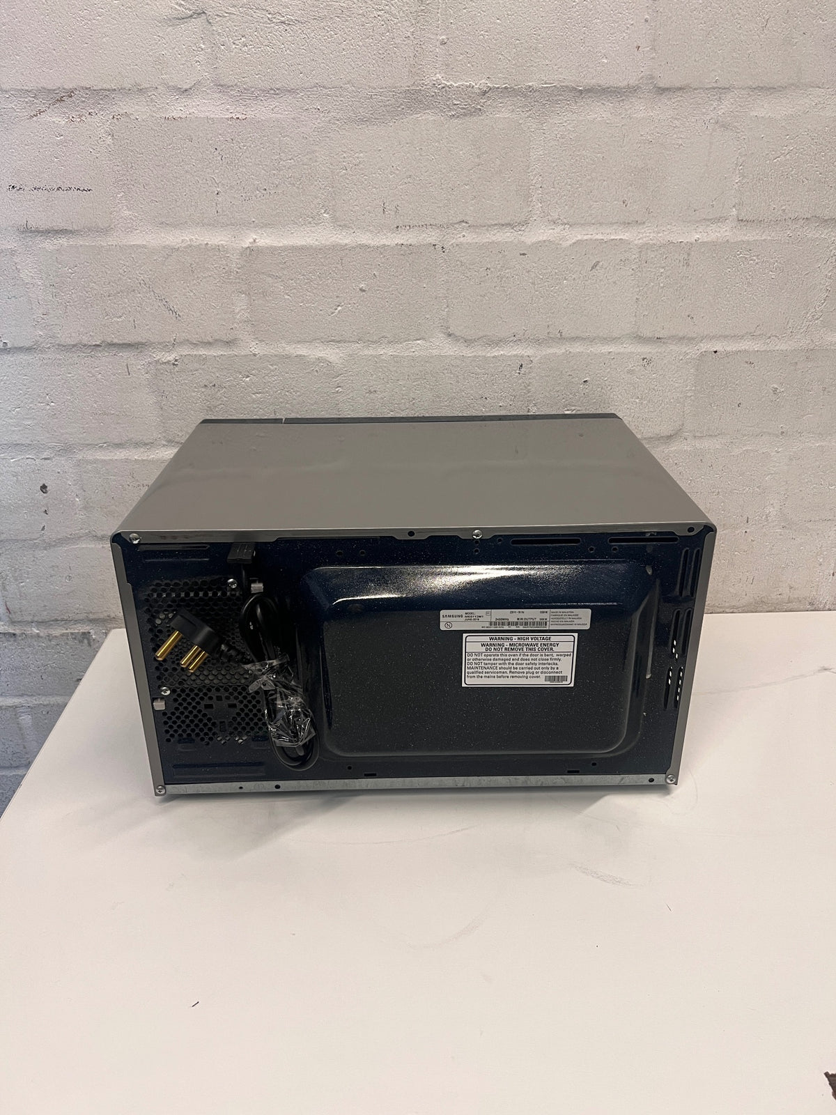 Samsung Mirrored Black Microwave – back view